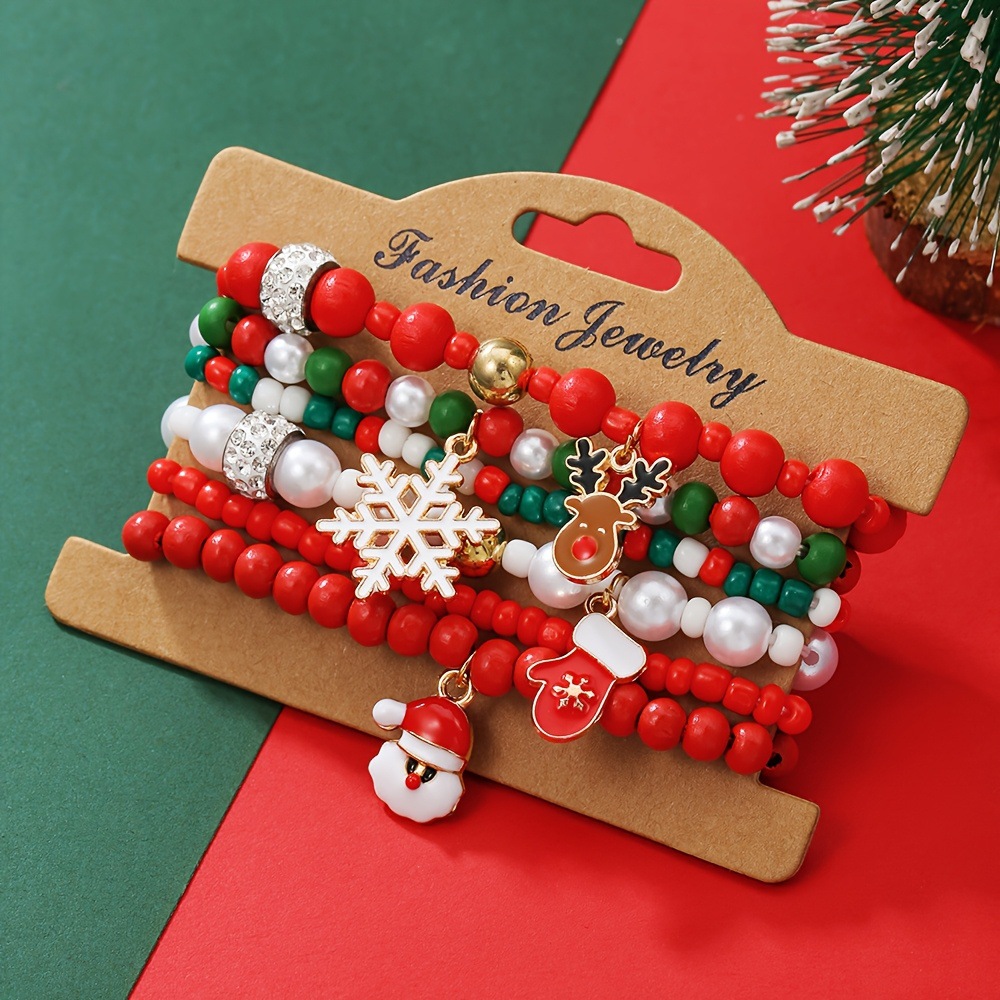 Christmas bracelet set with reindeer bells, Christmas tree beads, and woven polymer clay. - Image 6
