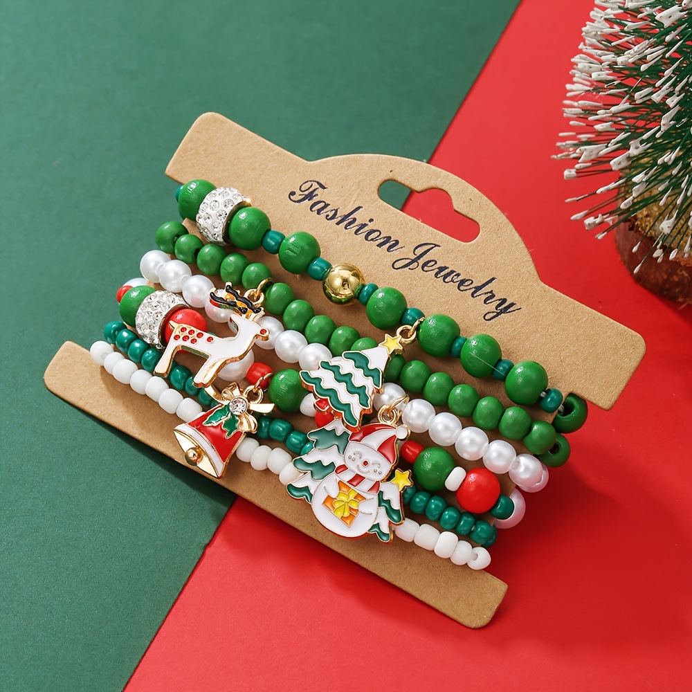 Christmas bracelet set with reindeer bells, Christmas tree beads, and woven polymer clay. - Image 7